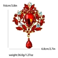 Broche luxueuse en alliage doré avec cristaux rouges et strass colorés brillants - Rouge