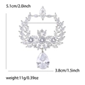 Macro-opname van olijftak speld met zirkonia kristallen en peervormige hanger - Zilveren Stijl (8310-SL) / Zilver