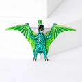 Detailopname van de pterosaurus broche met groen emaille en fijne legering textuur - Groen