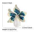 Spilla floreale elegante con pietra occhio di gatto e petali smaltati blu e cristalli - Placcato Oro 14K Blu