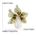 Elegante spilla orchidea oro con smalto verde, strass bianchi e pietra occhio di gatto - Placcato Oro 14K Verde