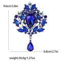 Vintage silberne Brosche mit tiefblauen Kristallen in Birnenform und Tropfenanhänger - Blau