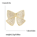 Elegant gold bow brooch with sparkling cubic zirconia stones and dimensional design - Gold (8328)
