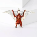 Oranje pterodactylus broche met zwarte stippen en emaille afwerking op witte blok - Bruin