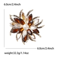 Broche fleur dorée avec cristaux ambrés, taille de 6 cm et poids de 32,3 g - Marron