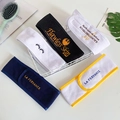 Detailed view of adjustable spa headbands with embroidery in a cozy lifestyle setting - Custom Style