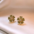 Macro shot of gold floral earrings with heart-shaped green crystals on silk fabric - Green Flower (2# Silver Earring Post) / Gold-Green