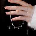 Elegante S925 Sterlingsilber Halskette mit funkelnden Zirkonia-Anhängern an O-Kette - Silber