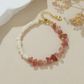 Detailed macro view of baroque pearl bracelet with pink strawberry quartz and lobster clasp - Natural Pearl Pink Quartz