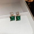 Detailed macro view of vintage emerald green square stud earrings in a white gift box - Gold Green Square (23# Steel Earring Post)