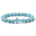 Macro detail of blue turquoise beads and silver metal spacers on a cross beaded bracelet - Turquoise With Spacer
