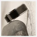 Detailed close-up showing the black spinning stainless steel ring for stress relief. - Size 10 / Fabric Texture Spinner Style (1-D-1) / 8mm Width / Black