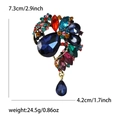 Colorful rhinestone brooch with teardrop pendant in navy, red, and green crystals - Colorful