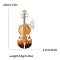Emaille-Violinenbrosche mit Schmetterling, Größe 4,8x2,2cm, Gewicht 6,8g in Orange - Orange (MM-BR-Orange-2908-OR)