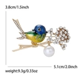 Spilla a forma di uccello colorato con perle e cristalli, misura 5,1cm x 3,8cm - Oro KC - Blu