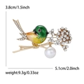 Spilla a uccello con smalto verde, cristalli e perla, misura 3,8cm per 5,1cm - Oro KC Verde