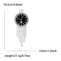 Spilla vintage a orologio in argento con smalto, strass e nappe metalliche lunghe - Nero