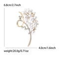 Luxury gold pearl brooch for women with sparkling rhinestones and dimension markings - Gold