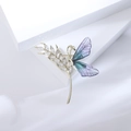 Elegant gold wheat brooch with purple dragonfly wings and crystals on white background - Purple