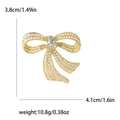 Elegant gold-tone bow brooch with small white pearls and sparkling crystals, 3.8x4.1cm size - Gold (MM-BR-2994-GD)