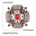 Vintage rose gold baroque brooch with ruby center and white diamonds in round openwork - Colorful