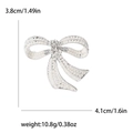 Elegant silver bow brooch with white pearls and rhinestones 4.1cm width design - Silver (MM-BR-2994-SL)