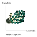 Elegante broche de pavo real dorado con cristales verde esmeralda, 6,5 cm, 18,2 g - Verde