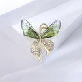 Broche papillon exquise avec des ailes vertes et des accents de cristaux brillants - Vert