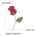 Sparkling red crystal rose brooch with green leaf accents and size dimensions detail - Red