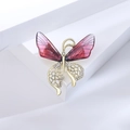 Broche papillon élégante avec ailes dégradées rouges et détails dorés alvéolés - Rouge