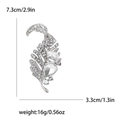 Silver leaf brooch with sparkling white rhinestones and large crystal accents - Silver