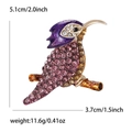 Detailed view of hummingbird brooch showing 5.1cm by 3.7cm size and rhinestone details - KC Gold Purple
