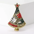 Detailed macro view of an antique gold Christmas tree brooch with colorful rhinestones - Antique Gold Multi-color Rhinestone