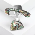 Fashionable silver brooch featuring a lady in a sun hat with iridescent abalone shell inlay - Silver