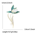 Elegante spilla a fiore di magnolia con smalto verde, zirconi e perla bianca intarsiata - Blu