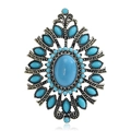 Broche barroco de plata antigua con piedras turquesas y patrones de filigrana - Azul