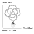 Detailed view of silver hollow camellia brooch with rhinestones and pearl drop - Silver