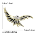 Goldene Adler Brosche mit funkelnden Strasssteinen und schwarzer Emaille für Anzüge - Grau