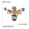Charming purple and orange bee brooch with colorful crystals and golden finish - Purple