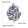 Macro detail of leaf brooch with blue rhinestones showing dimensions 5.9cm by 4.4cm - Dark Blue (3366-BL2)