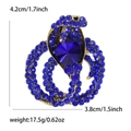 Golden snake brooch with deep blue rhinestones measuring 4.2cm by 3.8cm - Antique Gold Blue