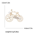 Elegante broche de bicicleta dorado con cristales brillantes y detalle de perla - Dorado/Blanco