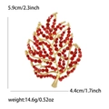Elegant maple leaf brooch with red crystals and gold plating, dimensions 5.9cm x 4.4cm - Red (3366-RD)