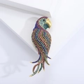 Detailed view of parrot brooch with multi-color rhinestones set in gold finish - Large / Rainbow Large