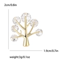 Spilla ad albero dorata con cristalli chiari e dimensioni 2cm x 1.9cm su sfondo bianco - Oro 8429