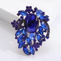 Vintage style brooch with a large navy blue crystal centerpiece and antique gold base - Blue Vintage Style (MM-BR-3514) / Blue