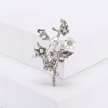 Elegant butterfly flower brooch with white pearls and sparkling rhinestones on silver base - Silver