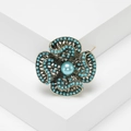 Vintage gold alloy flower brooch with turquoise beads and a sky blue center pearl - Turquoise Blue