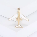 Golden airplane brooch with white enamel wings and sparkling rhinestones on geometric base - Gold