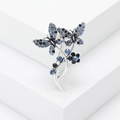 Vintage butterfly and floral brooch with blue crystals on minimalist white background - Blue Butterfly (MM-BR-BL)